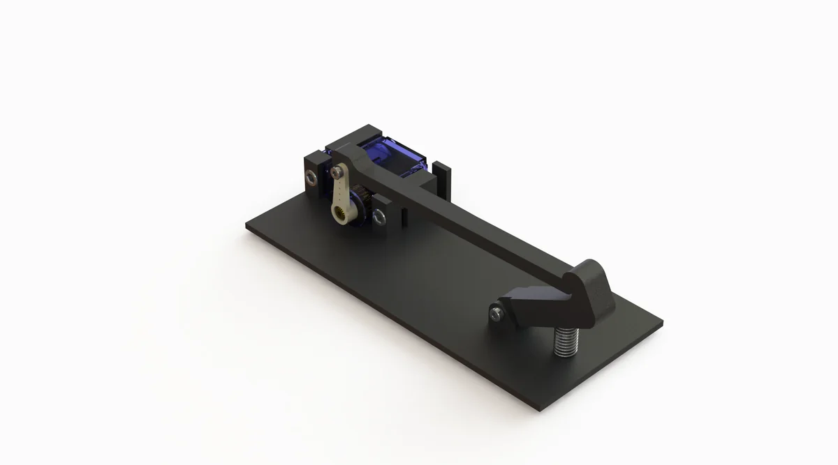 Three-quarter CAD render of the pedal actuator: a flat black baseplate carrying a compact motor and linkage at one end, with a long arm reaching to a pedal bracket at the other.